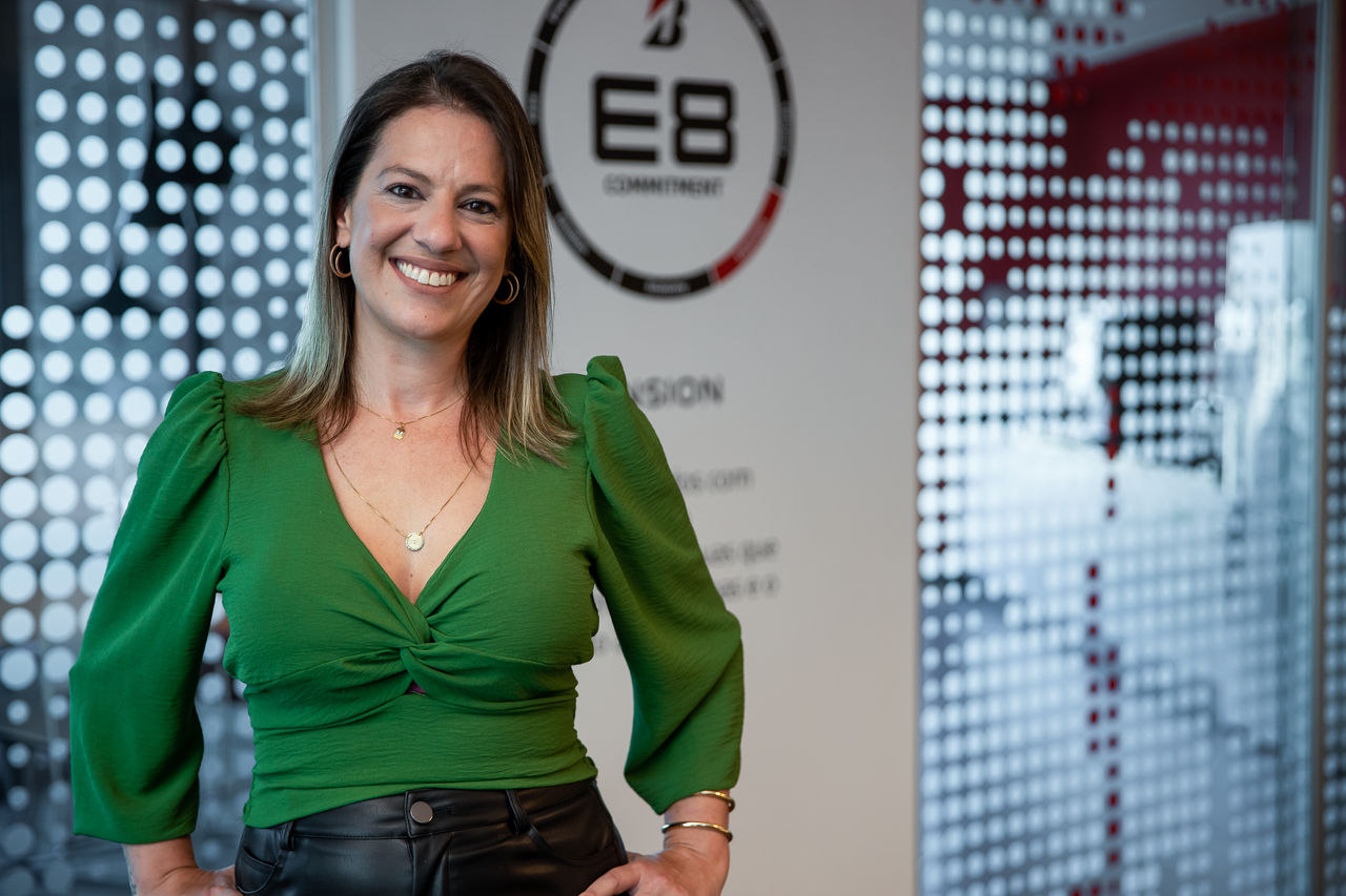 a woman in a green shirt