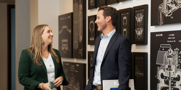 a man and woman looking at each other