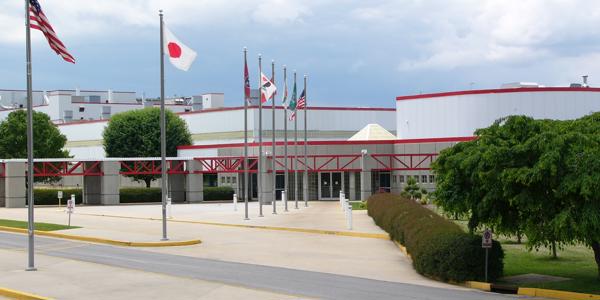 a building with flags in front of it