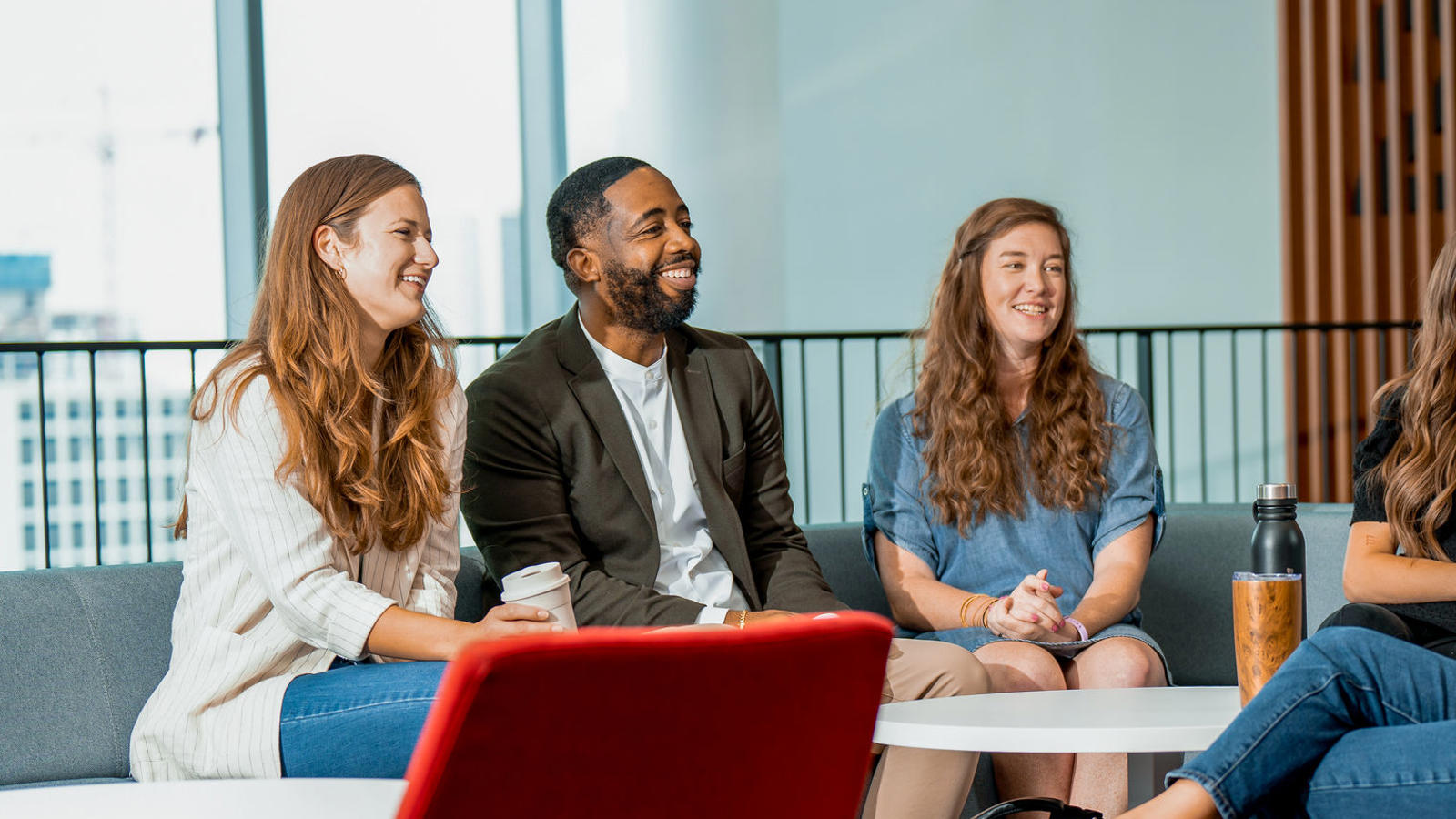 a group of people sitting in a circle