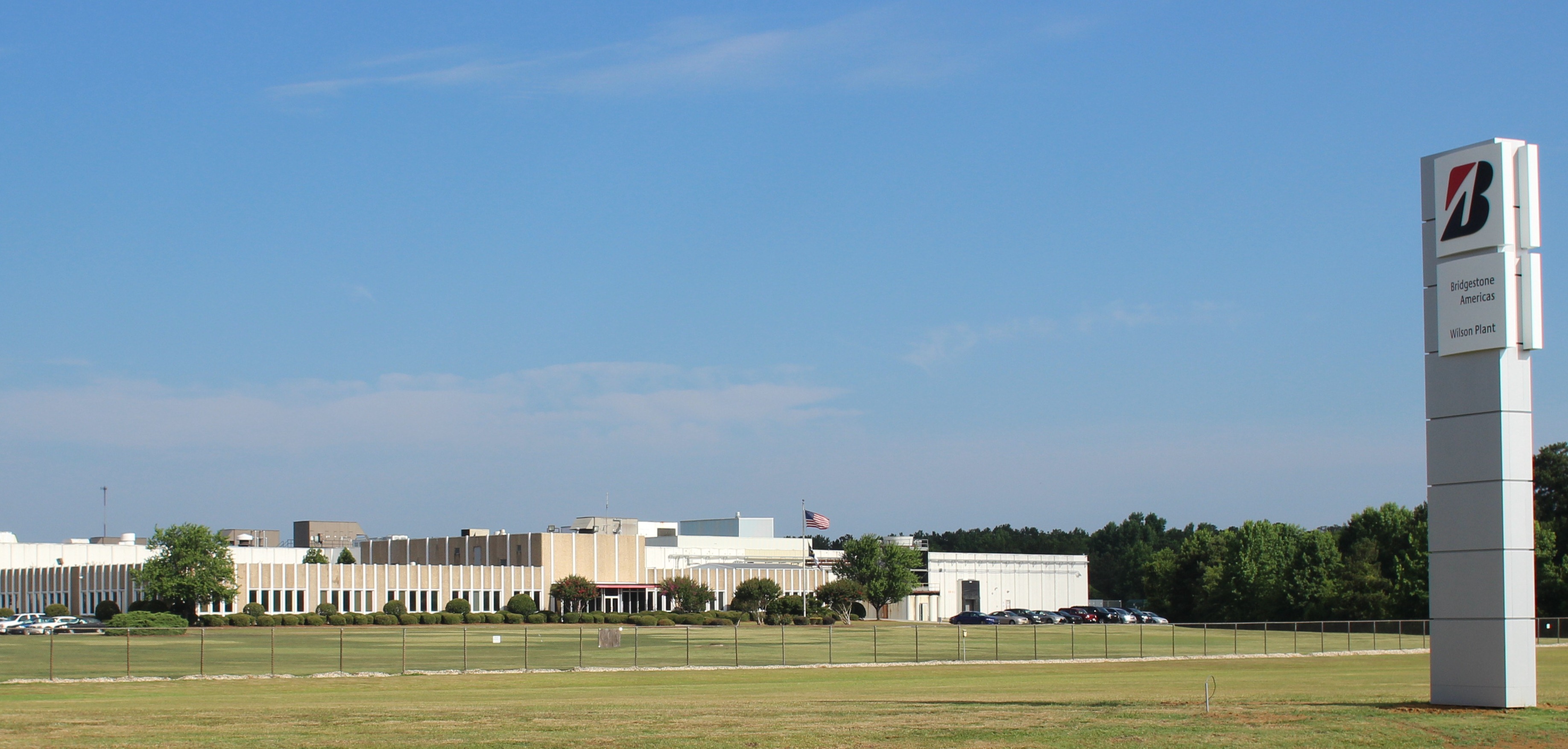 a building with a flag in the background
