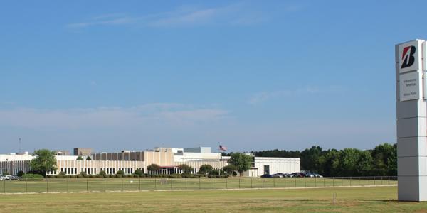 a building with a flag in the background