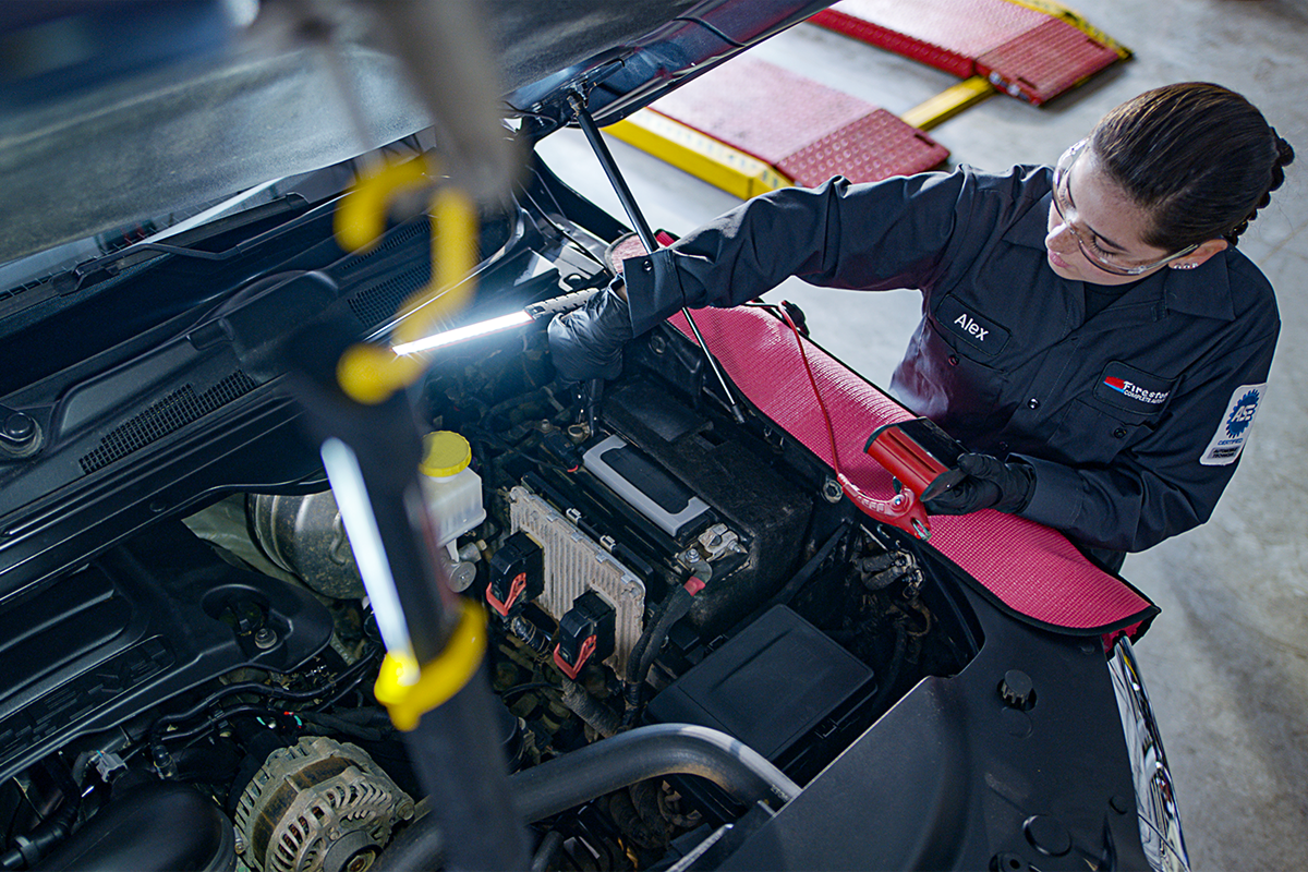 a man working on a car