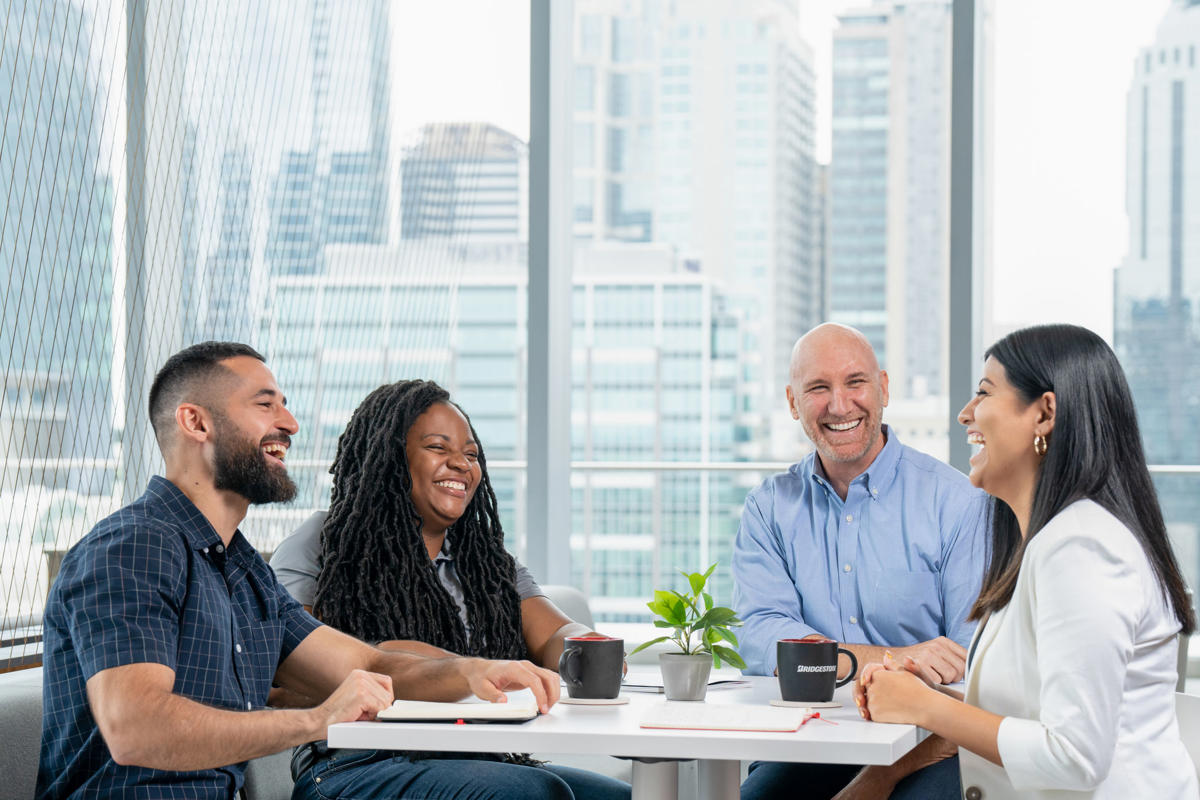 a group of people sitting at a table